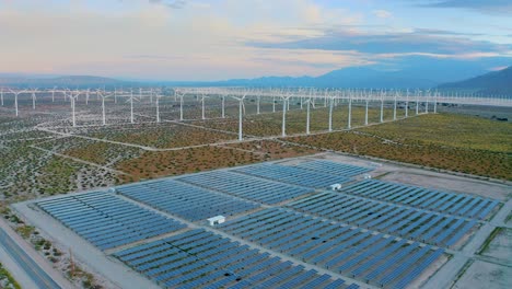 renewable energy drone aerial power plant solar panels sun wind mill windmills