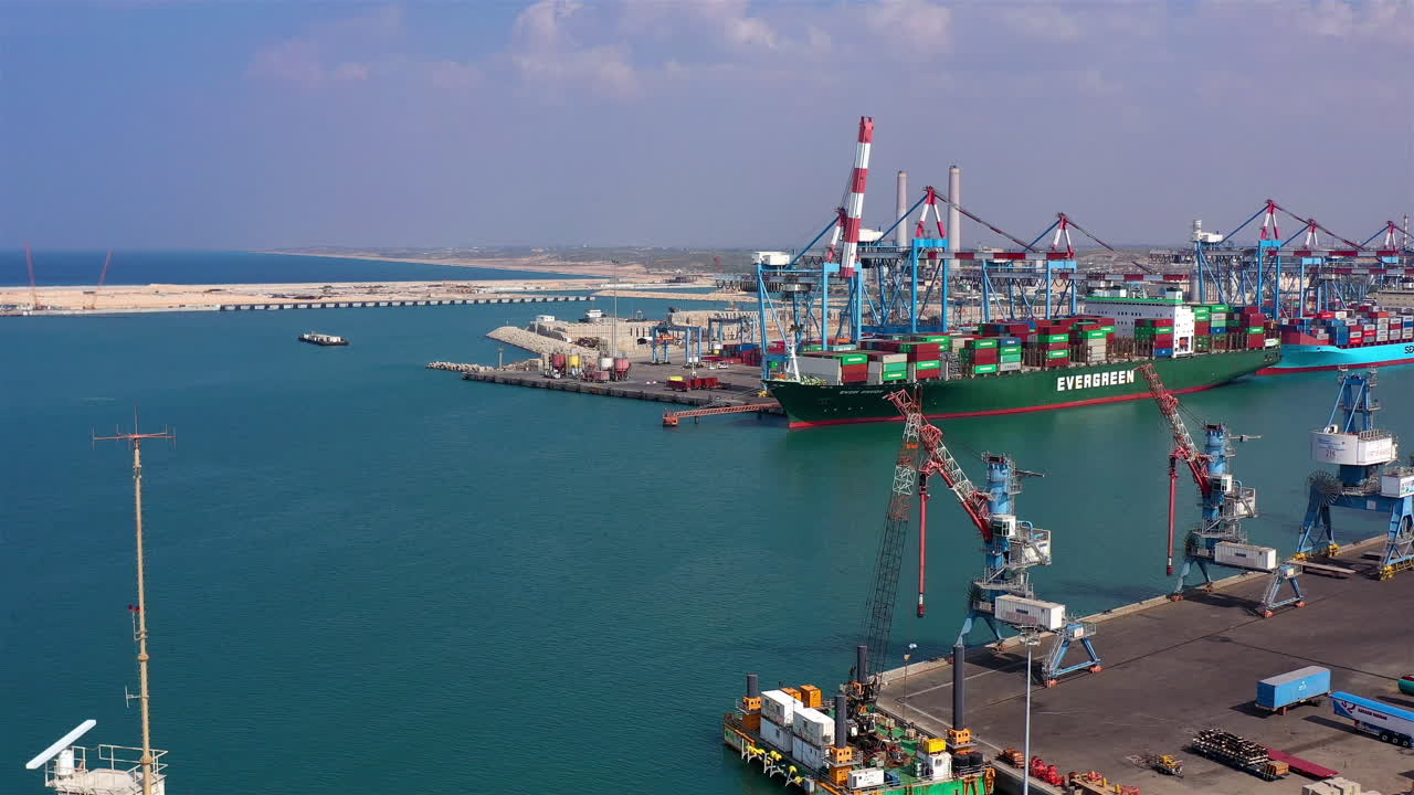 Aerial Footage over Harbor with Large tanker docking in Mediterranean sea