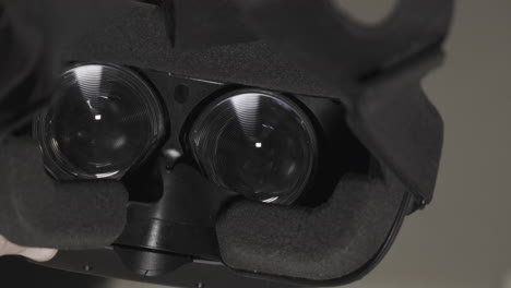 putting on a virtual reality vr-ar headset