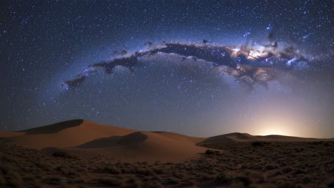milky way over sand dunes at night