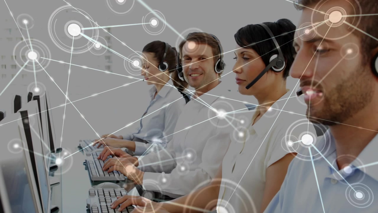 Animation of network of connections over diverse businesspeople using computers in office