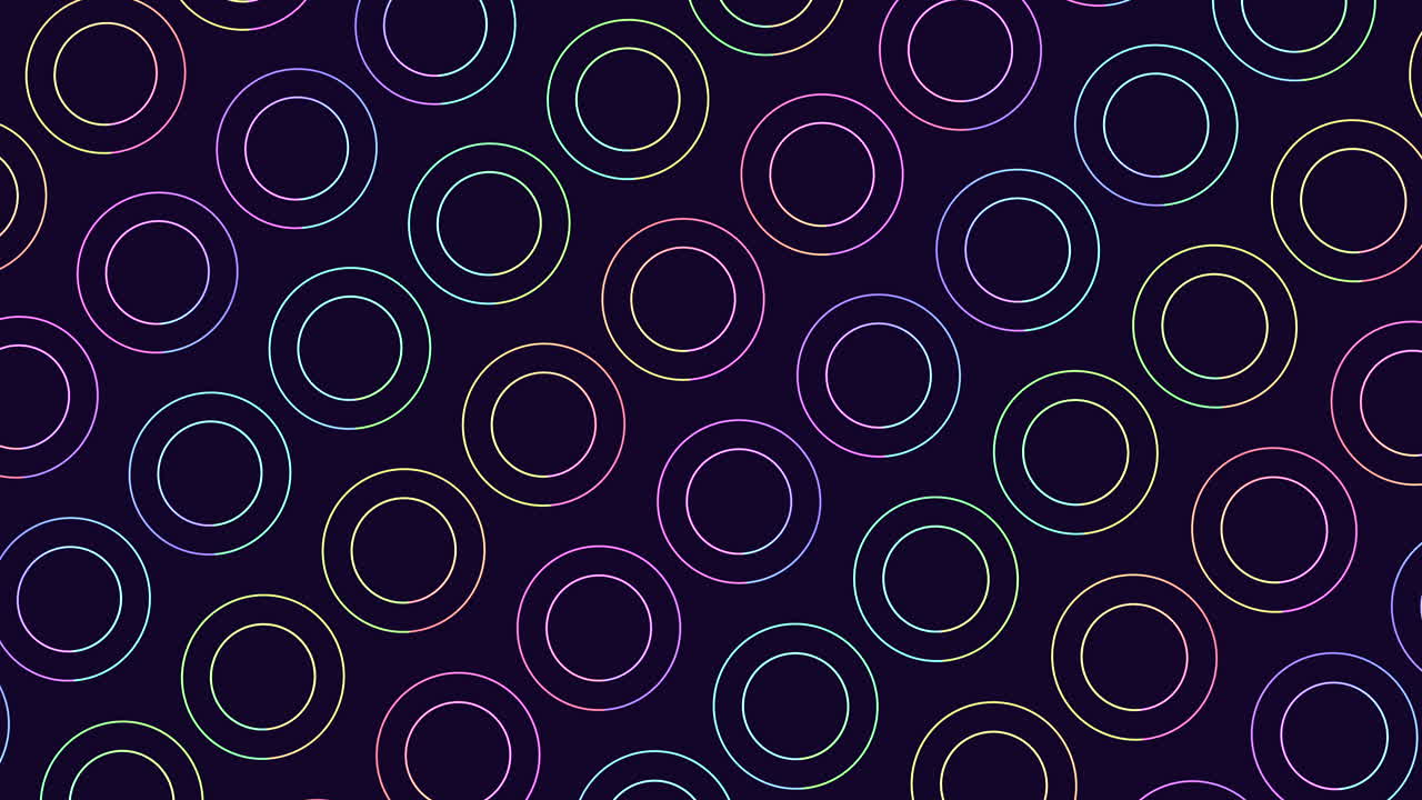 A mesmerizing circular pattern of purple and blue circles against a black background in this colorful and visually striking image