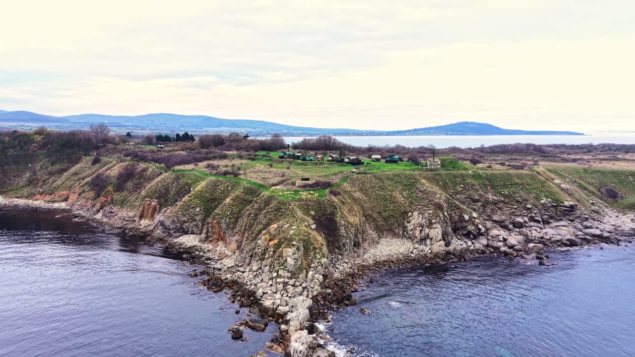 Stunning aerial view of rocky coastline and clear ocean waters