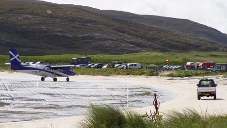 Shot-of-a-passenger-plane-after-landing-on-the-beach-at-Barra-airport