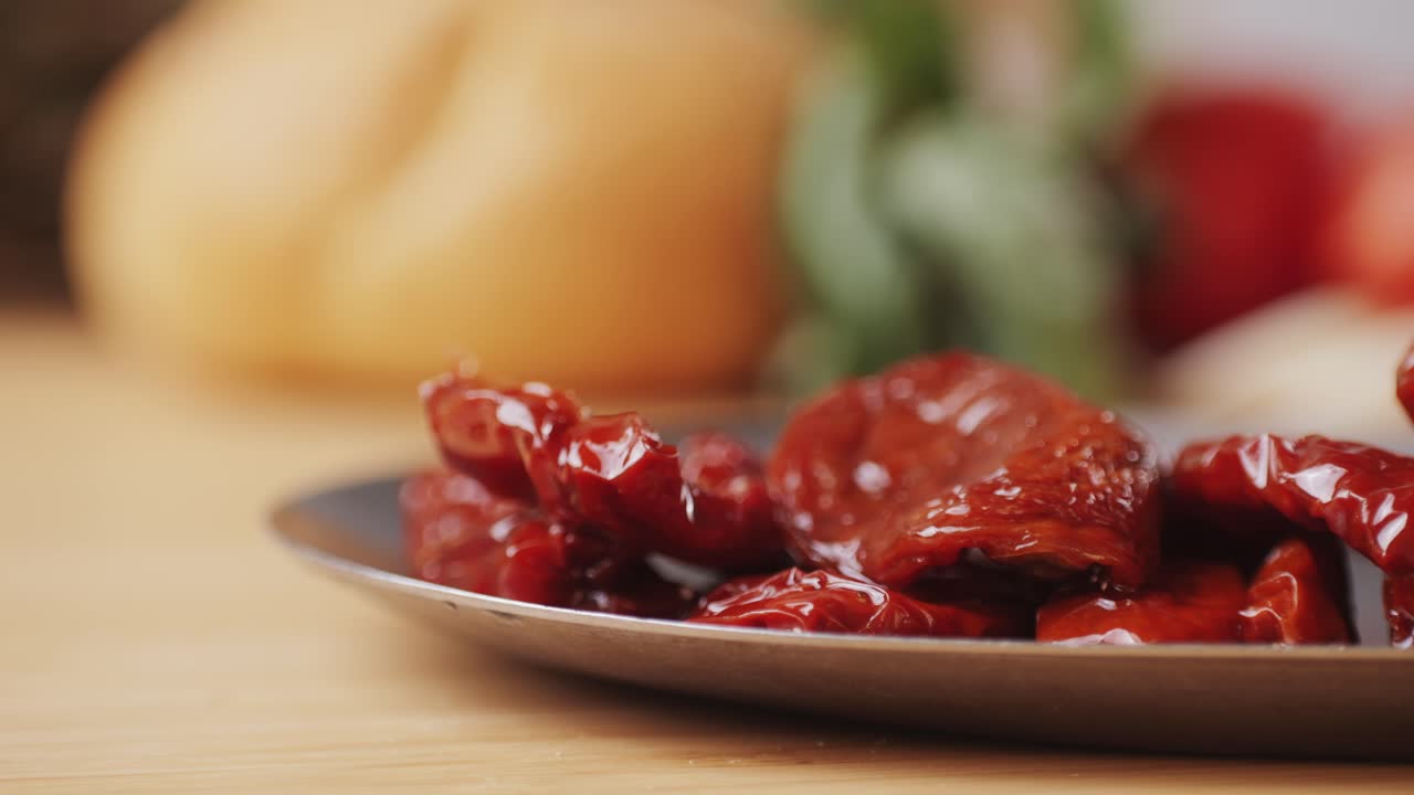 Dried tomatoes close up, Italian restaurant with traditional food, Spanish cuisine, delicious tapas and white wine, bruschetta with cheese, olives dry tomatoes and tasty sandwich bar appetizer, buffet