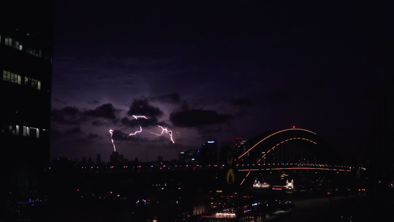 Lightning Over Sydney Harbour Bridge And Central Business District Of Sydney In New South Wales, Australia. - wide shot