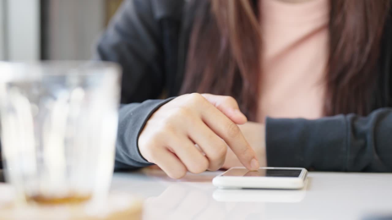 Close up female hands holding smartphone using mobile application,Concept of using technology in daily life online shopping online payment
