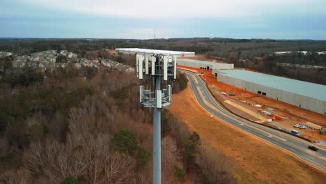 aerial shot of cell phone tower in nature