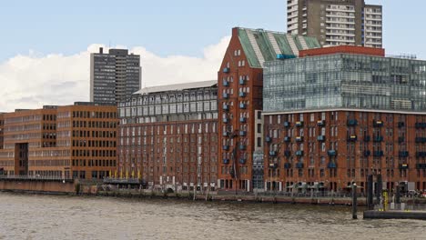 Profile-view-of-a-vintage-architecture-of-a-wide-residential-building-in-Hamburg,-Germany