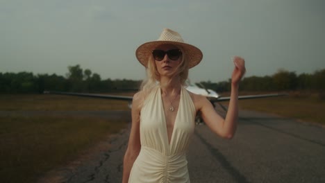 woman in a stylish dress at an airport