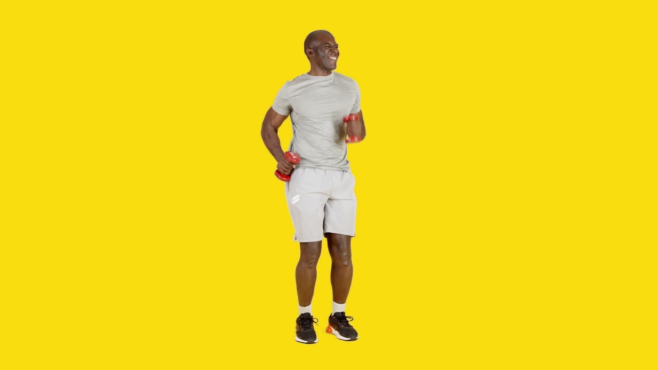 Funny african sportive man dancing and joking