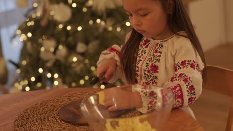 mother and daughter preparing for christmas celebration