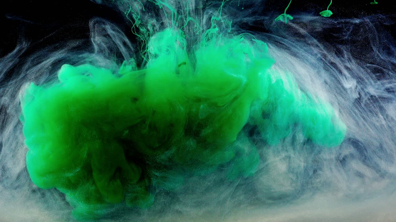 Abstract Green and White Ink Swirling in Water