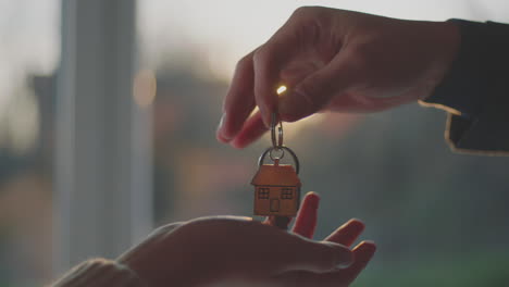 man giving keys to a lady