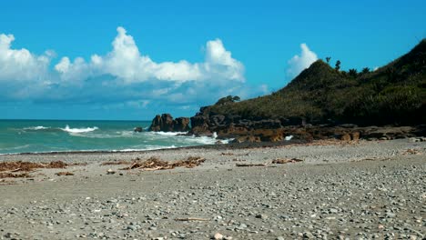 ocean waves crashing over a rugged rocky point in a stunning coastal scene