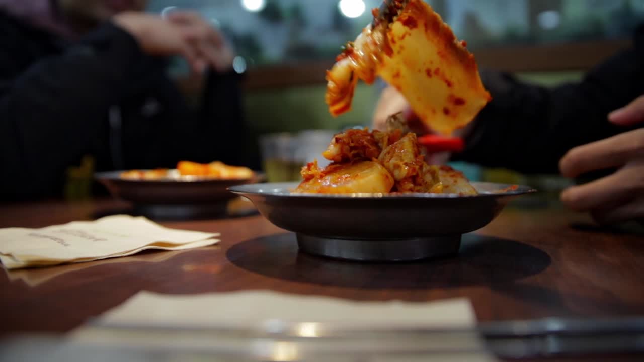 Seoul Korea Kimchi cutting table preparation on the dinner table