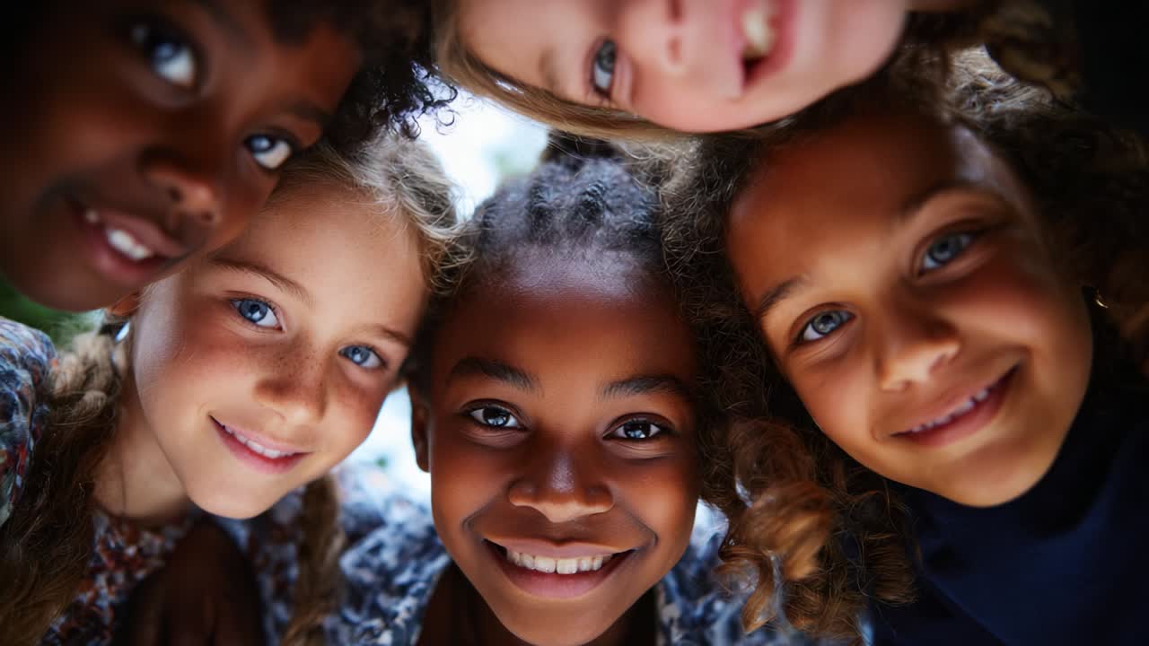 A joyful circle of happy children sharing smiles and laughter, showcasing their diverse beauty and friendship in a heartwarming moment of joy and togetherness filled with youthful energy and innocence