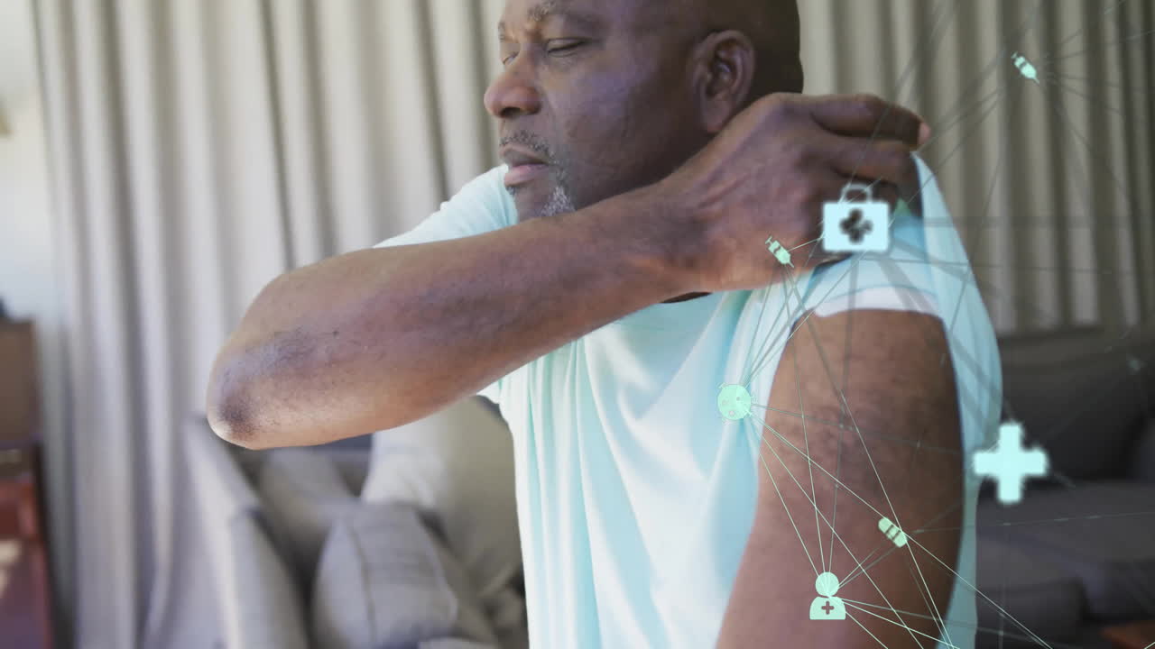 Animation of network of connections with icons over senior african american man