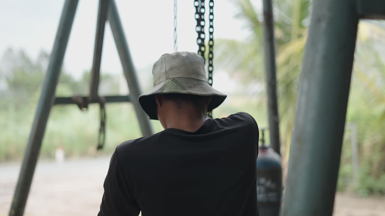 Worker Operating a Lifting System