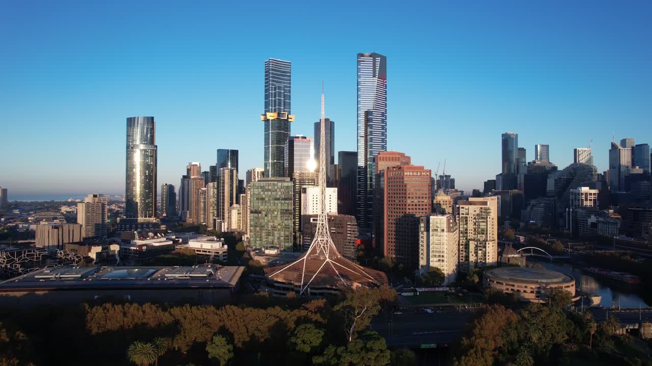 Aerial rise up over Melbourne arts district, skyline skyscrapers in Australia