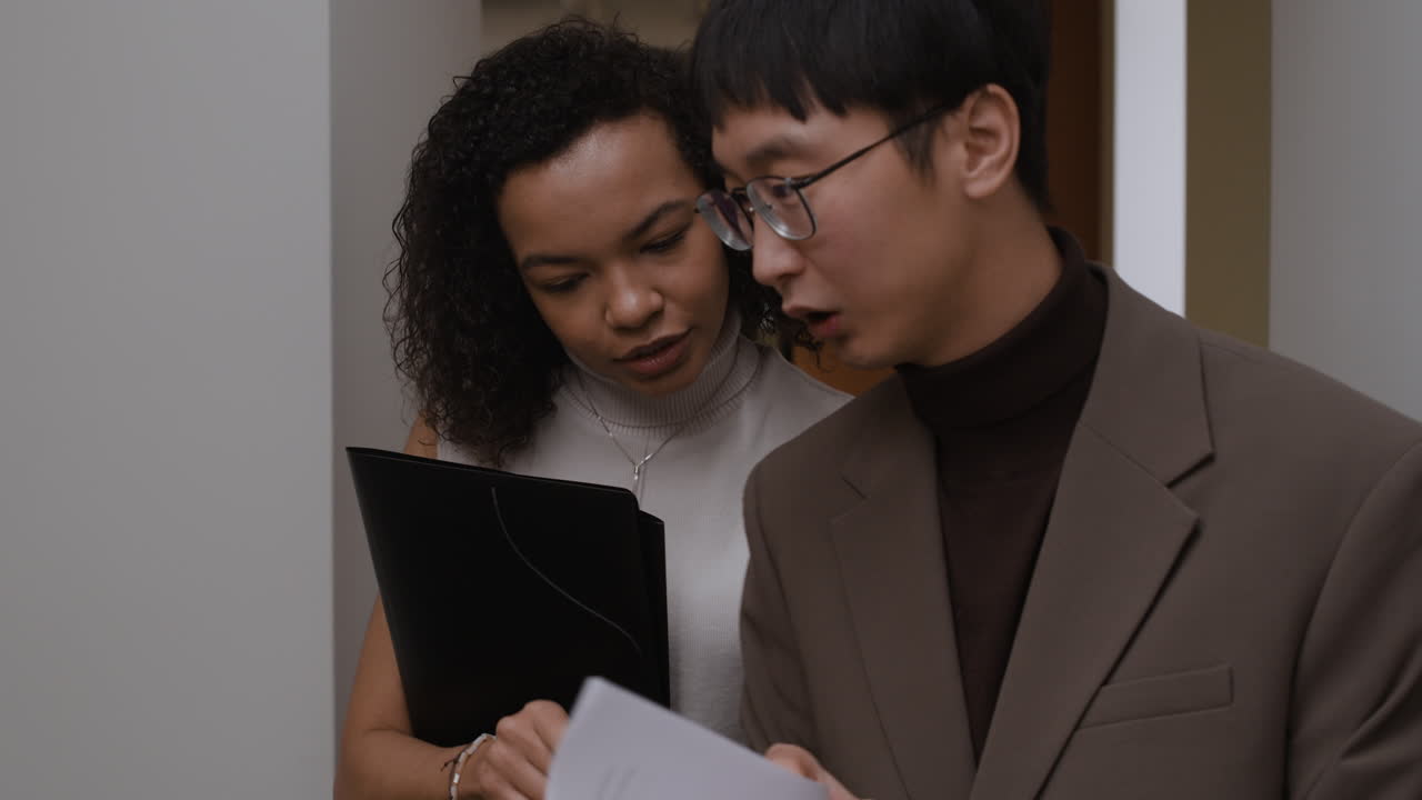 Business colleagues reviewing documents