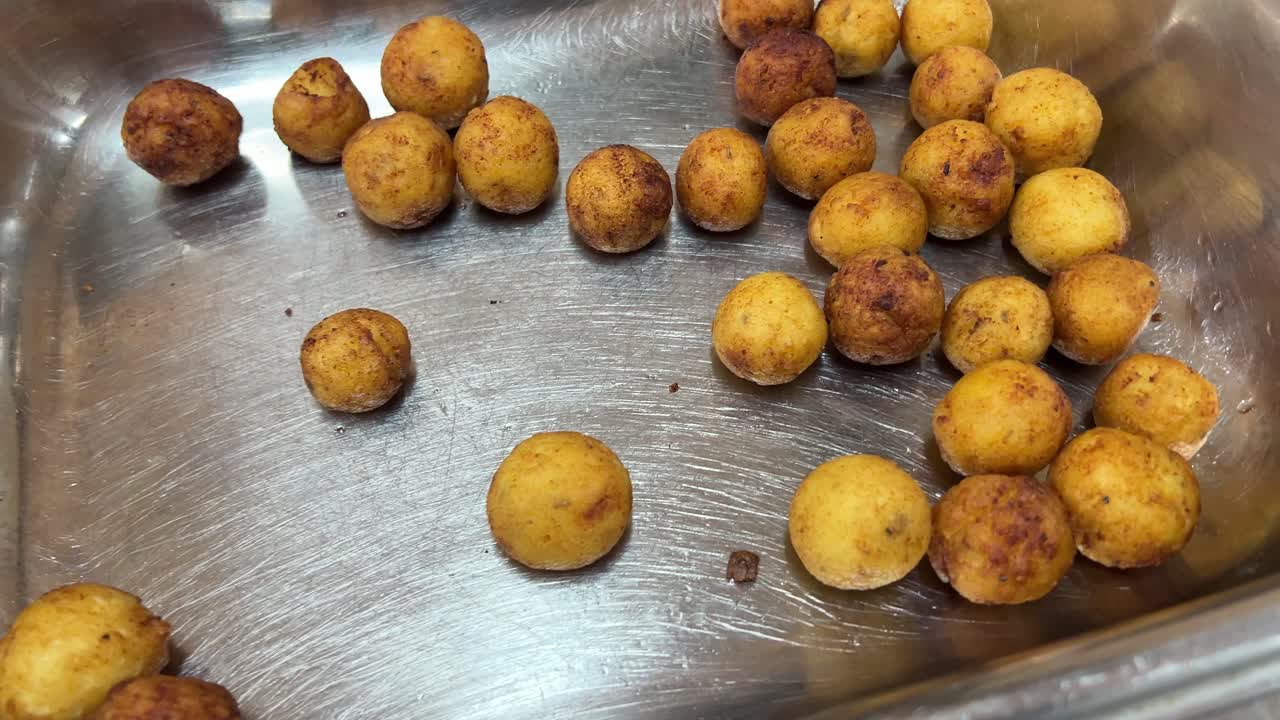 Some cheese balls left for guests in wedding.