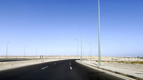 Driving-On-Desert-Paved-Road-In-Hurghada,-Egypt,-Middle-East