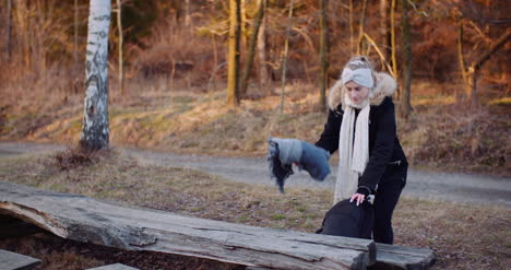 woman taking a brake in mountains