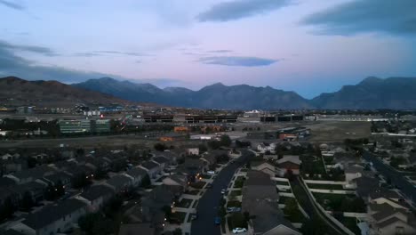 silicon slope beneath the majestic rocky mountains of lehi, utah - aerial panoramic parallax view