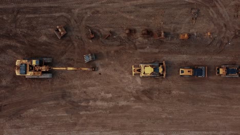 aerial flyover of heavy equipment at a calgary job site