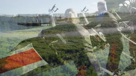 rowing in animation, two people over lush green landscape with buildings