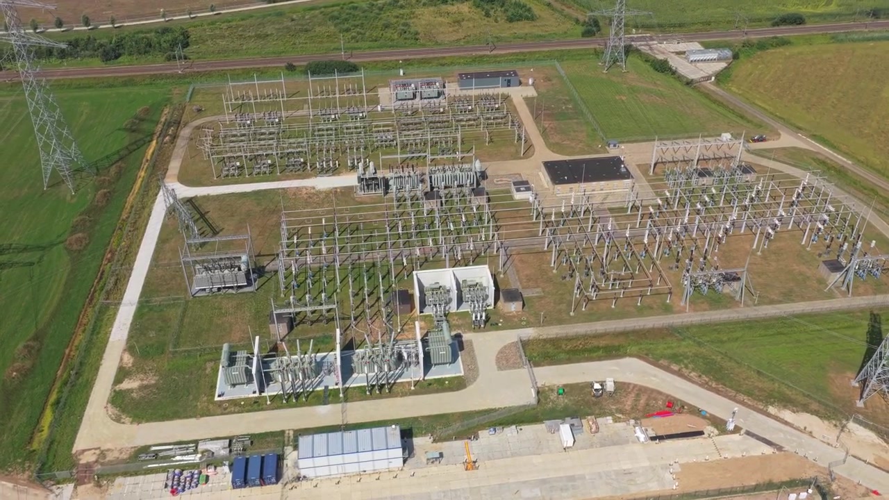 Aerial View of an Electrical Substation in a Rural Landscape