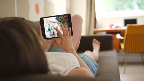 a woman relaxing looking through photos