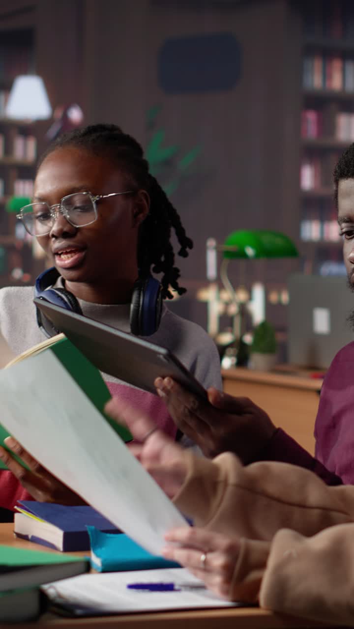 Vertical video multicultural students group discussing financial project for university course