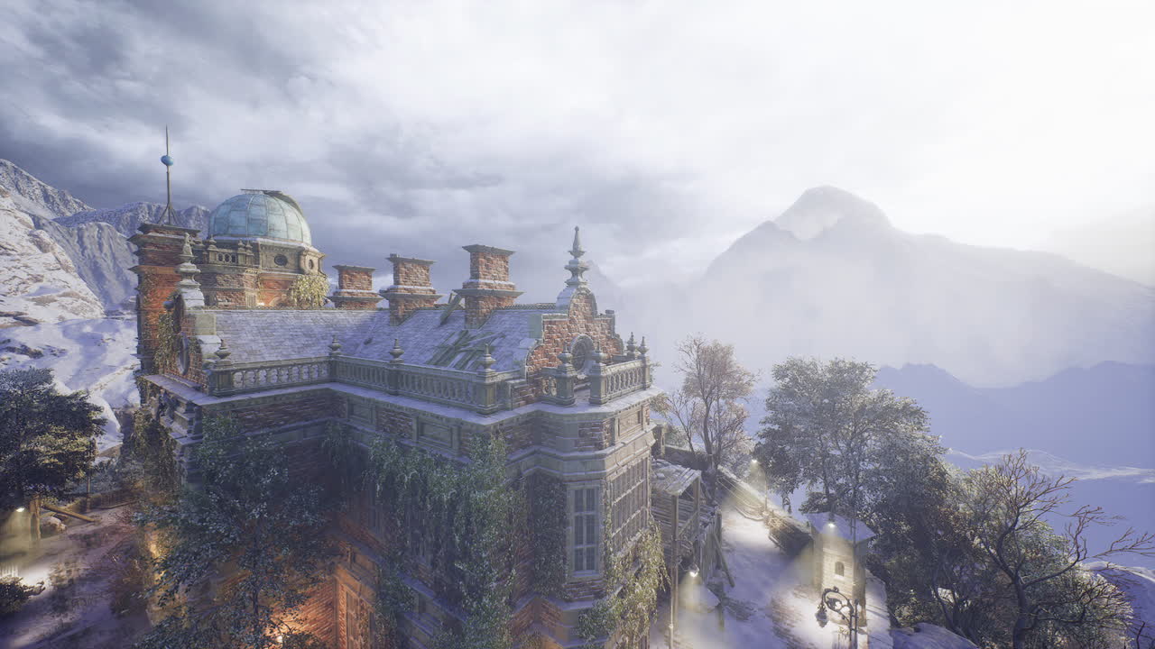 Snow covered mansion at twilight surrounded by mountains and trees