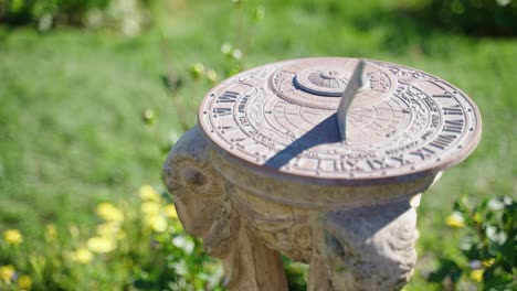 sundial located in a green garden on a sunny day