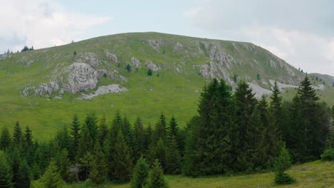 Aerial-truck-shot-of-Jadovnik-mountain-in-southwestern-Serbia-on-a-bright-clear-day