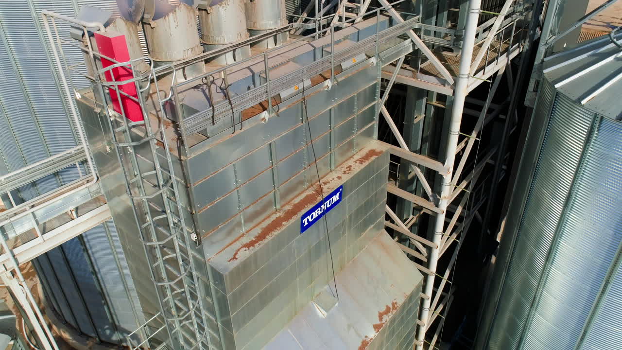 Industrial elevators building exterior. Aerial view of grain elevators for storing wheat and other cereal grains