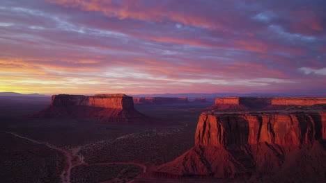 vibrant sunset sky over red rock desert mesas