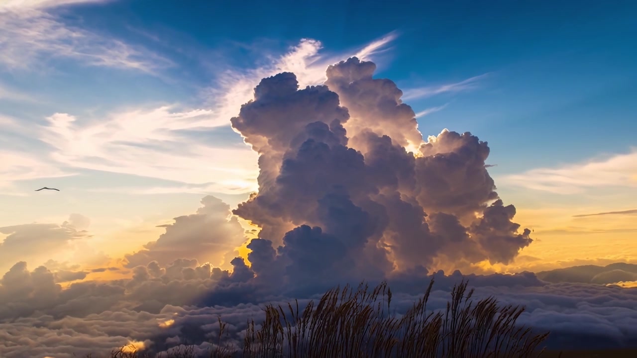 Dramatic Sunset Clouds Over Mountain Landscape