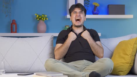 man having a nervous breakdown at home is shouting.