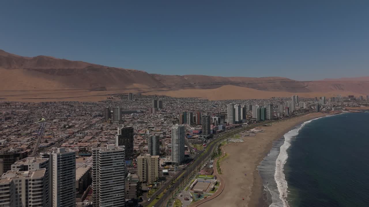 Iquique playa brava chile tarapaca cavancha day beach blue sky city at noon drone air