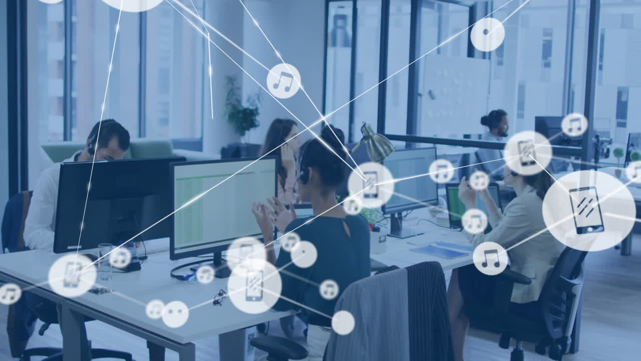 In modern office, diverse people working with animation of digital icons floating