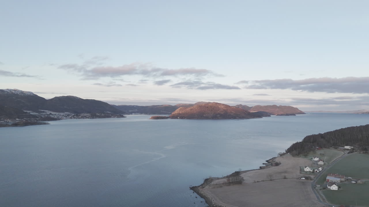 Drone shot over the valley near Forsand Norway near sunset on a clear day LOG