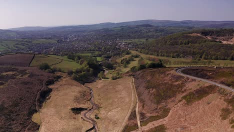Aerial-Drone-lowering-over-fields-in-Peak-District-United-Kingdom