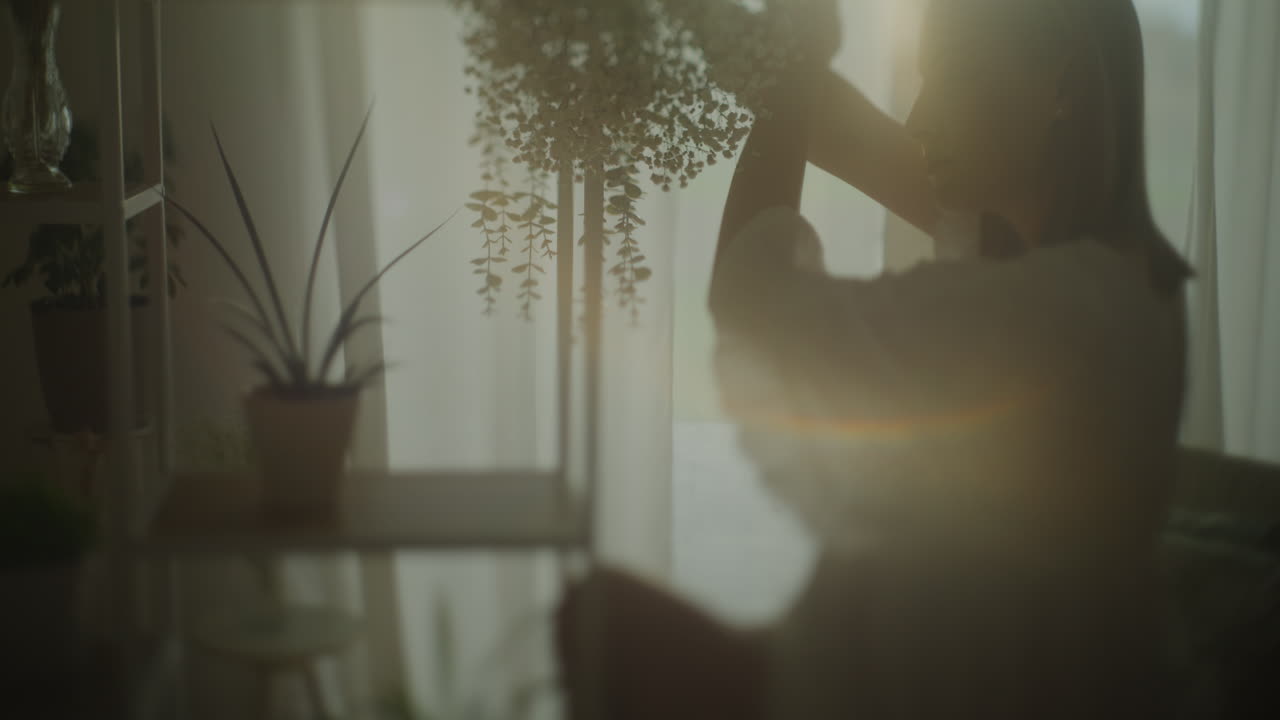Pregnant Woman with Gypsophila in Sunset