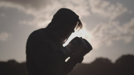 Man-Boxing-In-The-Park-Whislt-Silouetted-Against-The-Sun---Ungraded