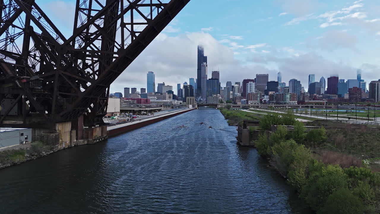 Aerial view following a rowing team passing the Ping Tom park, in Chicago