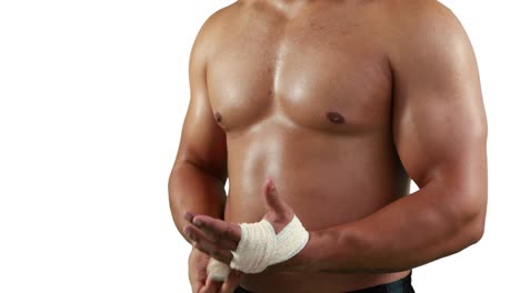 Serious-muscular-man-wearing-bandage-
