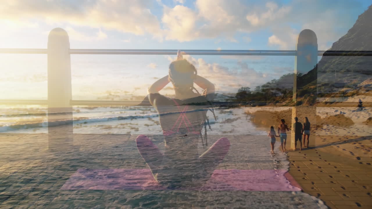 Yoga pose animation over beach scene with people walking along shore